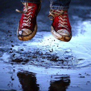 Foto credit: Red converse shoes puddle jumping by Toni Kami