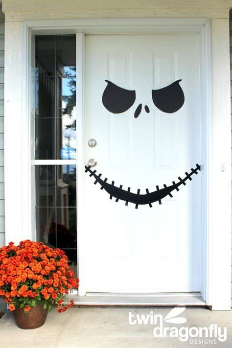 Come fare una decorazione di Halloween da appendere alla porta